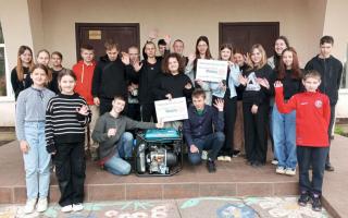 People in Ukraine with one of the donated generators