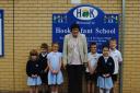 Patricia Cranham from Hook Infant School with pupils