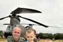 Flt Lt John Stevens, from RAF Odiham, with Tyler Haw-Davidson, four, and Hayden Haw-Davidson, two, from Old Basing