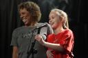 Concert organiser Natasha Watts with young singer Grace Keare