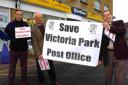 Cllr Tony Thorpe, Cllr James Robertson and Cllr  Ian Curr organising a petition at the Victoria Park Post Office. DB3320P6