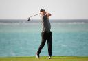 KING ABDULLAH ECONOMIC CITY, SAUDI ARABIA - FEBRUARY 01: Justin Rose of England tees off on the 17th hole during Day two of the Saudi International at the Royal Greens Golf.