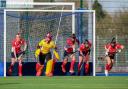 Basingstoke Ladies 1s defending a penalty corner. From left to right: Aoife Smyth, Gemma Carswell (GK), Sophie Ferguson-Smith, Ellis Williams and Alessia Barber. Credit: Duncan Rounding