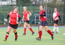 Basingstoke Ladies 4s celebrating their first win. From left to right: goalscorer Caroline Mackay (scored a hat-trick on Saturday), Mitch Lloyd and Georgie Kenward