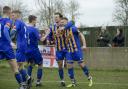 Basingstoke Town celebrated a 3-0 win over Ashford at the weekend.