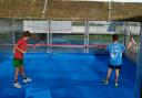 Kids playing squash at the newly built outdoor court in Basingstoke.