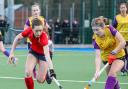 Basingstoke Ladies 2s player Heidi Lloyd in red, who had one assist and scored the winning goal in a 3-2 win against Winchester 1s