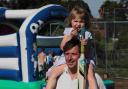 Jason Farrell with daughter Millie, 5, at the community fun day
