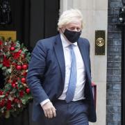 Prime Minister Boris Johnson leaves 10 Downing Street, London, to attend Prime Minister's Questions at the Houses of Parliament on Wednesday, December 8, 2021.