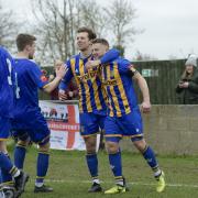 Basingstoke Town celebrated a 3-0 win over Ashford at the weekend.