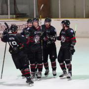 George Norcliffe (centre) all smiles after scoring his hat-trick goal against Sheffield.