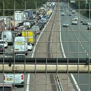 Two people injured after accident involving a car leaving the M3