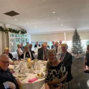 The members and company enjoying the festive lunch