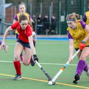 Basingstoke Ladies 2s player Heidi Lloyd in red, who had one assist and scored the winning goal in a 3-2 win against Winchester 1s