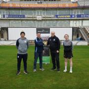 Hampshire's senior cricket development manager Michael Pollard and Serious Cricket managing director Neil Rider with Hampshire Cricket’s Felix Organ and Southern Vipers’ Emily Windsor on either sides