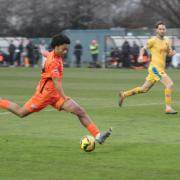 Mason Obeng about to shoot home the winner for Hartley Wintney