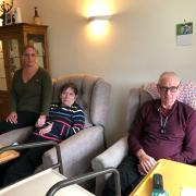 Lou Blunden with her parents Tina and Roy Mepham, who are calling for the lift in their retirement housing complex to be fixed after a month