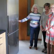 Oakley Bowling Club members with a new fridge freezer bought with the grant money