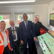 Pat Butler, signal and telegraph engineering manager; chairman of East Hampshire District Council Cllr Anthony Williams, Lord Kamall, and Rod Wicks, signal man at Medstead and Four Marks station