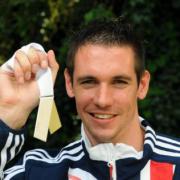 400m star Rob Tobin with his relay silver medal from the 2010 European Championships.