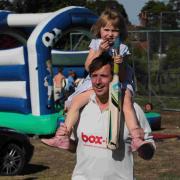 Jason Farrell with daughter Millie, 5, at the community fun day