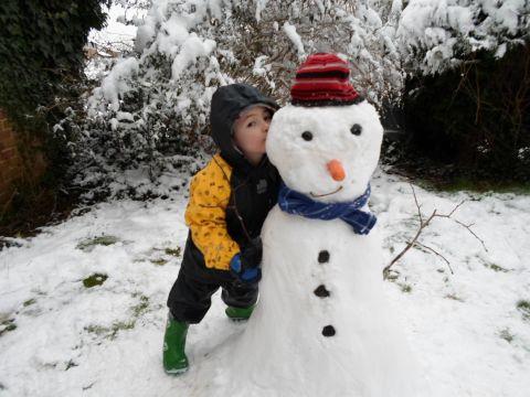 Oz Kelly with his snowman