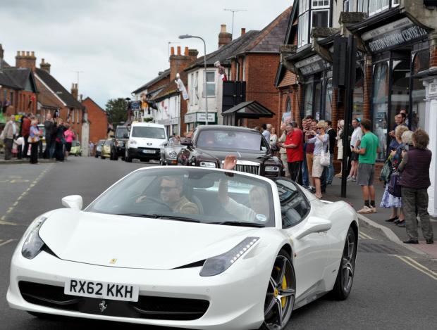 Radio 2 DJ Chris Evans led parade of Magnificent Seven cars through Overton