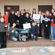People in Ukraine with one of the donated generators