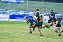 Adam Clayson scores the opening try