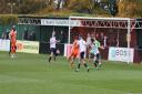 Mitch Parker scores the first goal for Hartley Wintney. Photo by Josie Shipman