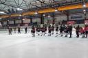 Bison players give guard of honour for Alex Mettam, who announced retirement from the game.