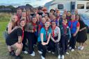 Basingstoke Gang Show cast and volunteers with Chris Evans at CarFest