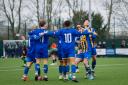 Basingstoke Town celebrate their opening goal against Didcot Town