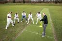 Cllr Kerry Morrow (batting) with members of the Capital Cricket Club in slip positions