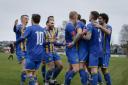 Basingstoke players celebrate their win against Poole