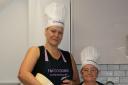 Big cook little cook, caregivers Ingrid Woodhouse, left, and Carol Freeman, right, 