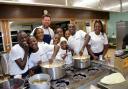Pop Up Kitchen at Brighton Hill school, Basingstoke.
Brighton Hill school pupuls and children from the Kings Kid Choir children's home in Uganda prepare and serve food.

Chef Mark Lloyd from School Diners helps the pupils make a