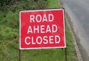 An emergency road closure is in place