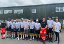 The team of cyclists and their support at the end of their fundraising cycle