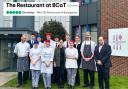 Restaurant manager Daniel Spittle right, staff and students