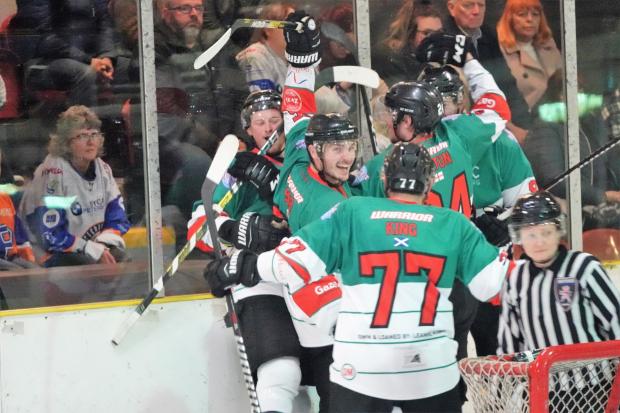 Bison celebrate scoring in their 6-0 victory against the Phantoms in the Autumn Cup on Saturday. Photo: Jo Loat.