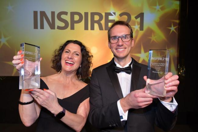 Melanie Redding, chair of the board, and Lewis Oaten, chief technology officer, of RazorSecure celebrate winning two awards at the Inspire21 awards. Photo: Sean Dillow.
