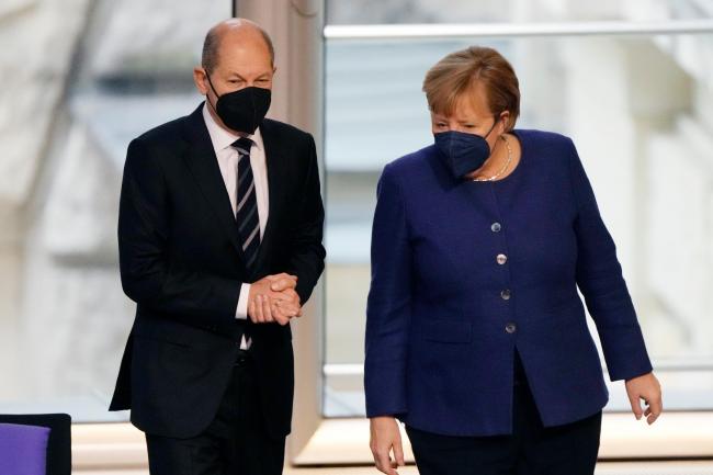 German chancellor Angela Merkel, right, and finance minister Olaf Scholz