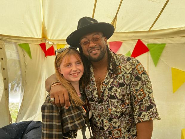 Basingstoke Gazette: Ortise Williams with young carers from Basingstoke