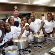 Pop Up Kitchen at Brighton Hill school, Basingstoke.
Brighton Hill school pupuls and children from the Kings Kid Choir children's home in Uganda prepare and serve food.

Chef Mark Lloyd from School Diners helps the pupils make a