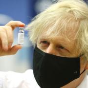Boris Johnson has said all adults in the UK will be offered their first Covid vaccine dose by the end of July. Photo: PA Wire.
