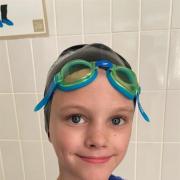 Ollie Cameron swam 5k to raise money for charity