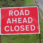 An emergency road closure is in place
