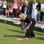 Borough councillor Diane Taylor trying out bowling.