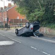 Car rolls on roof after crash on Winchester Road